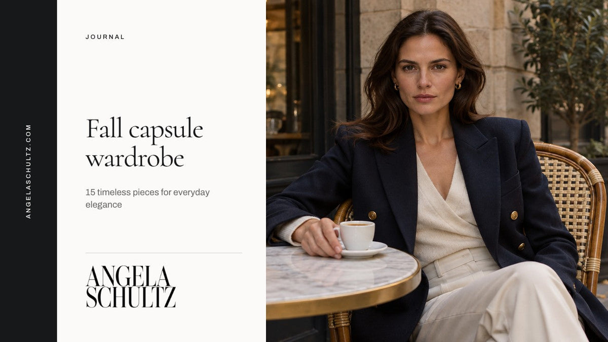 Woman in a navy double-breasted blazer over an ivory wrap knit at a bistro table