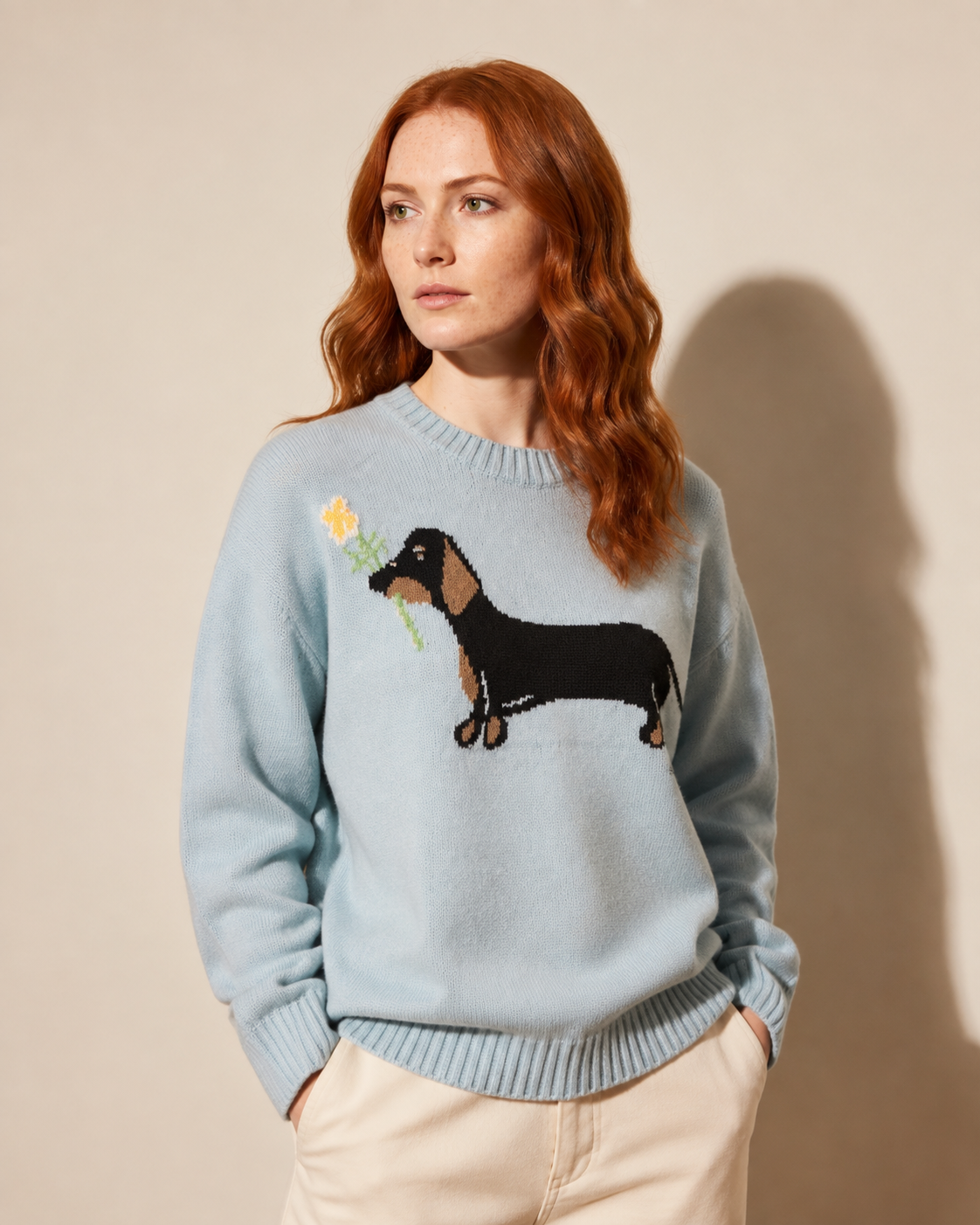 Women's Dachshund Motif Crewneck Knit Sweater in Sky Blue, 02 standing lifestyle, worn by model