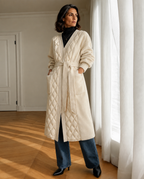 Women's Belted Diamond-Quilted Mid-Length Coat in Creamy White, 02 standing lifestyle, worn by model
