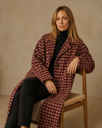Women's Long Plaid Button-Front Coat for Smart Layering in Red, 03 seated or leaning, worn by model