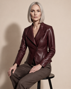 Women's Faux Leather Moto Jacket with Zip Front in Angola Red, 03 seated or leaning, worn by model