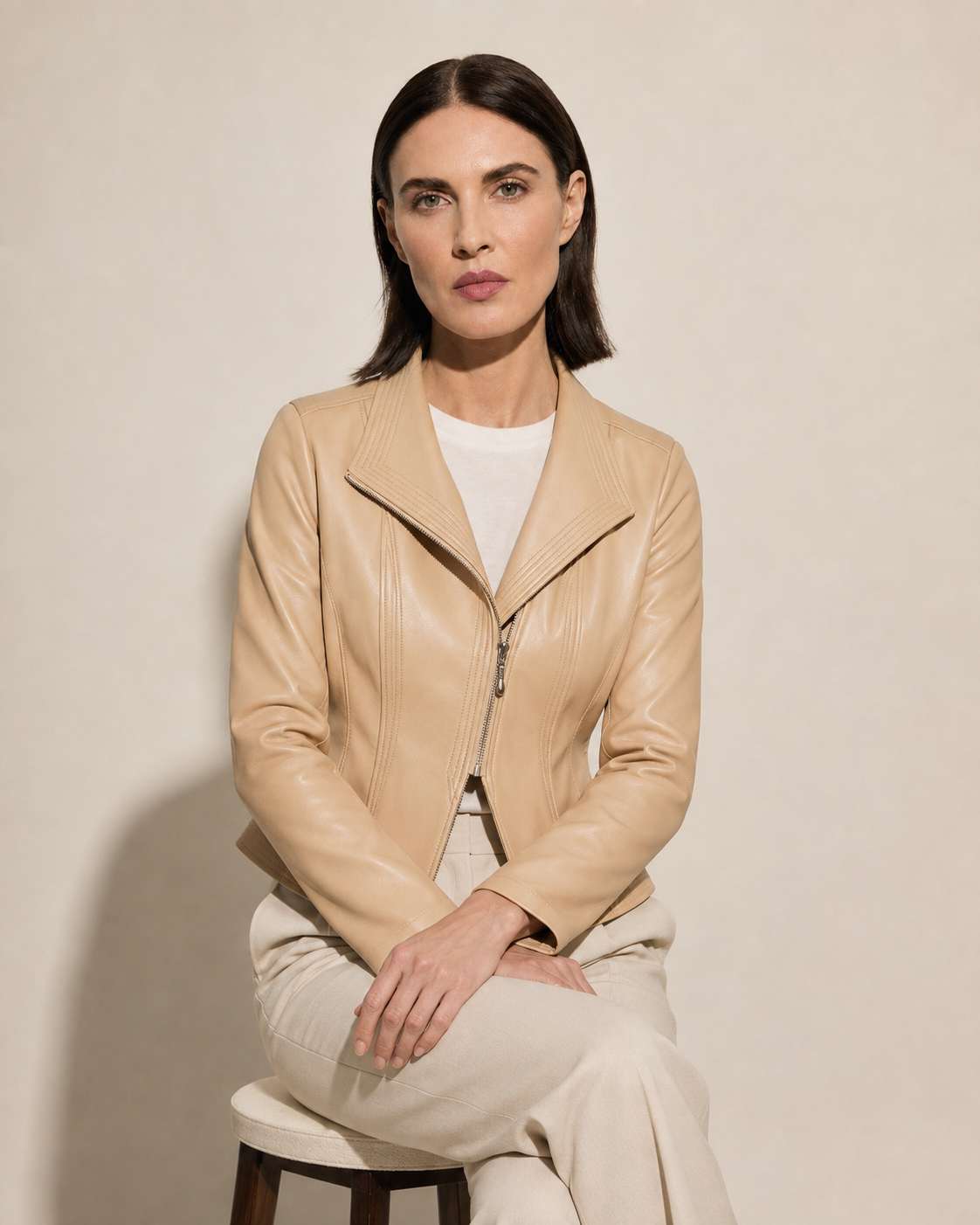 Women's Faux Leather Moto Jacket with Zip Front in Apricot, 03 seated or leaning, worn by model