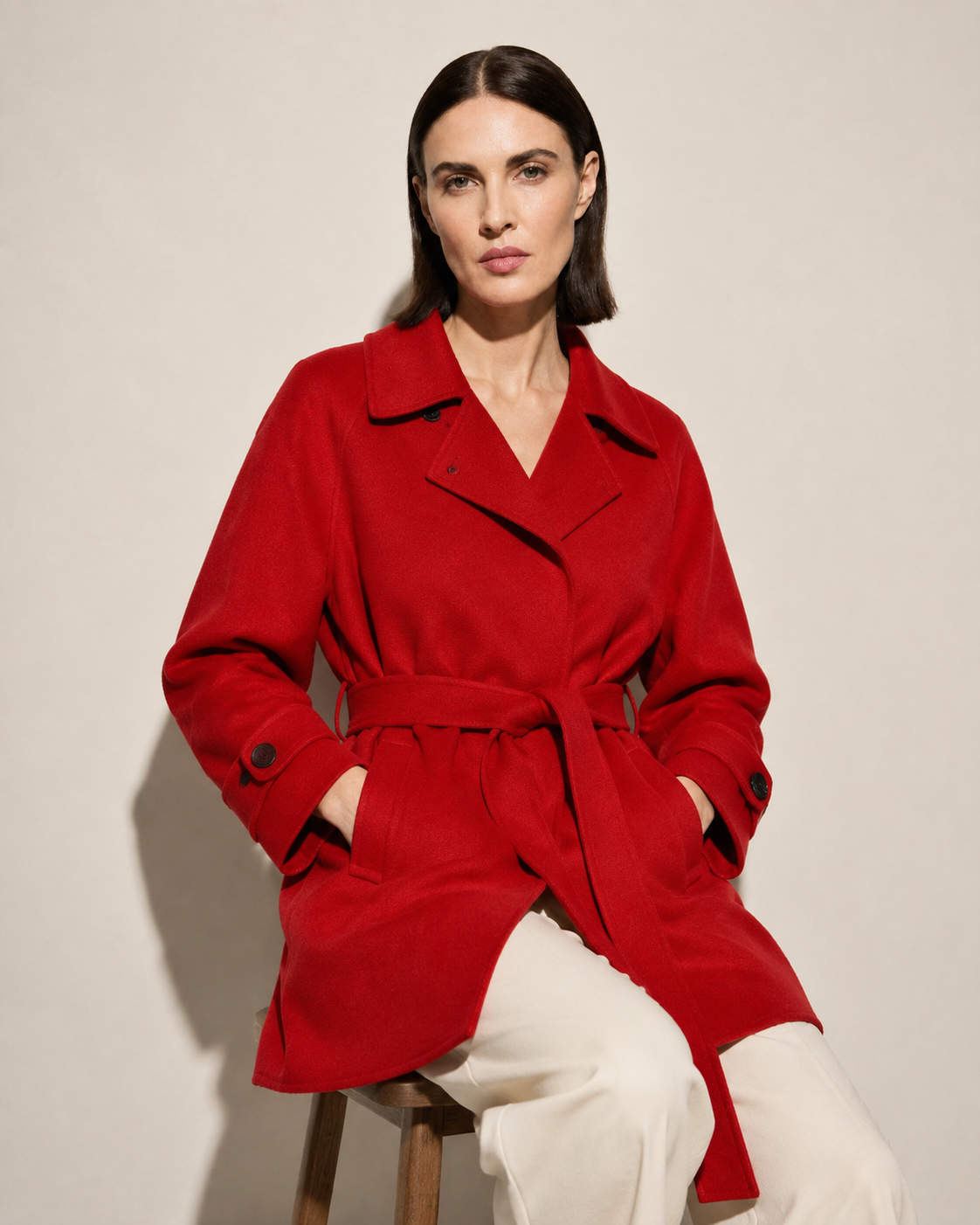 Women's Belted Wool Coat with Chest Flap Pockets in Bright Red, 03 seated or leaning, worn by model