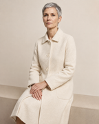 Women's Longline Lapel Coat for Everyday Layering in Off white, 03 seated or leaning, worn by model