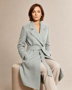 Women's Belted Wrap Coat with Draped Hem in Light Green, 03 seated or leaning, worn by model