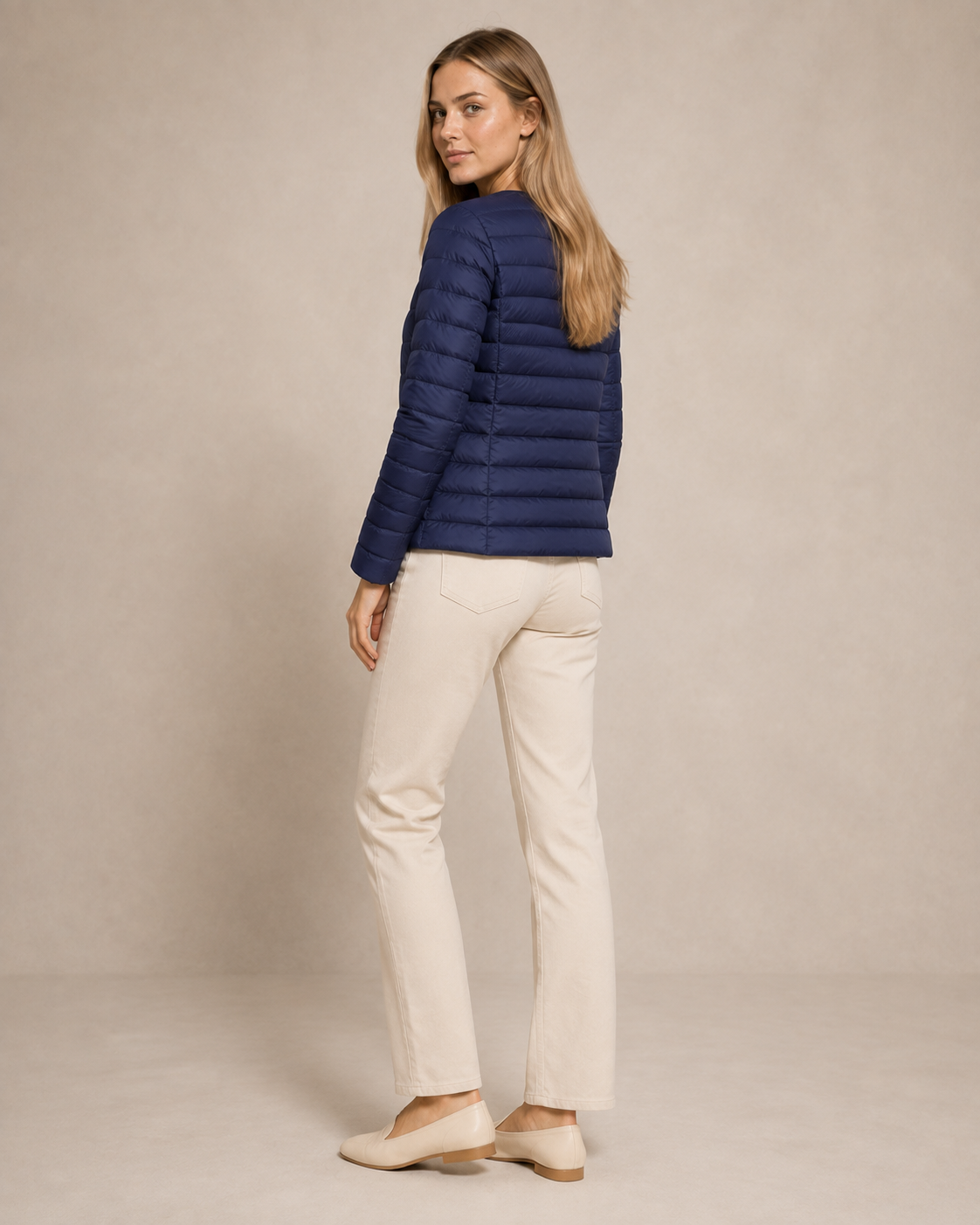 Women's Lightweight Down-Filled Quilted Jacket for Layering in Navy Blue, 04 back or side, worn by model