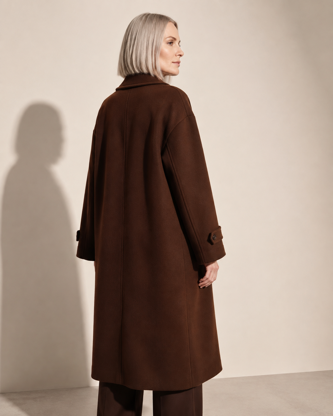 Women's Double-Breasted Long Coat with Patch Pockets in Reddish Brown, 04 back or side, worn by model