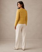 Women's Lightweight Down-Filled Quilted Jacket for Layering in Ginger Yellow, 04 back or side, worn by model