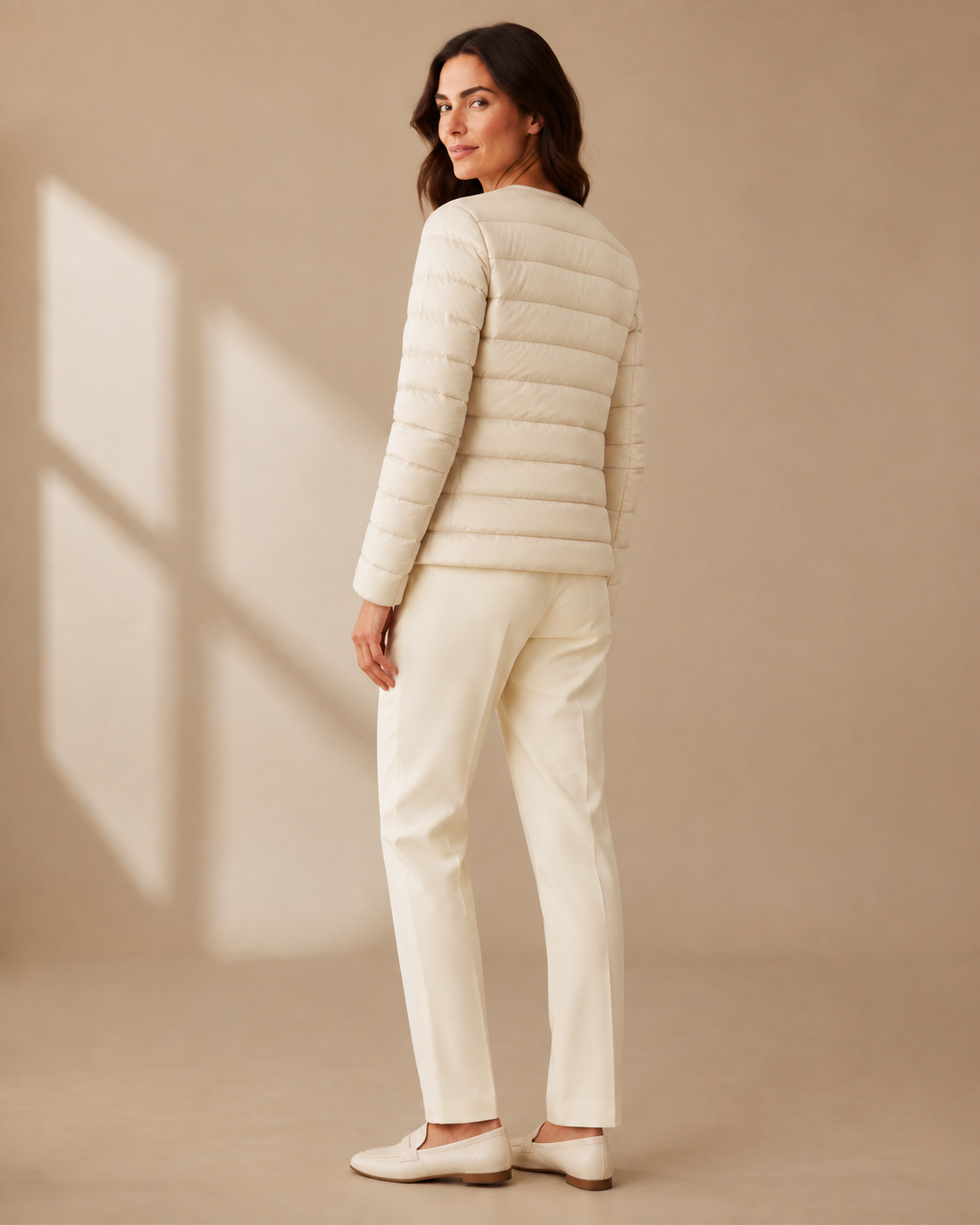 Women's Lightweight Down-Filled Quilted Jacket for Layering in Beige, 04 back or side, worn by model