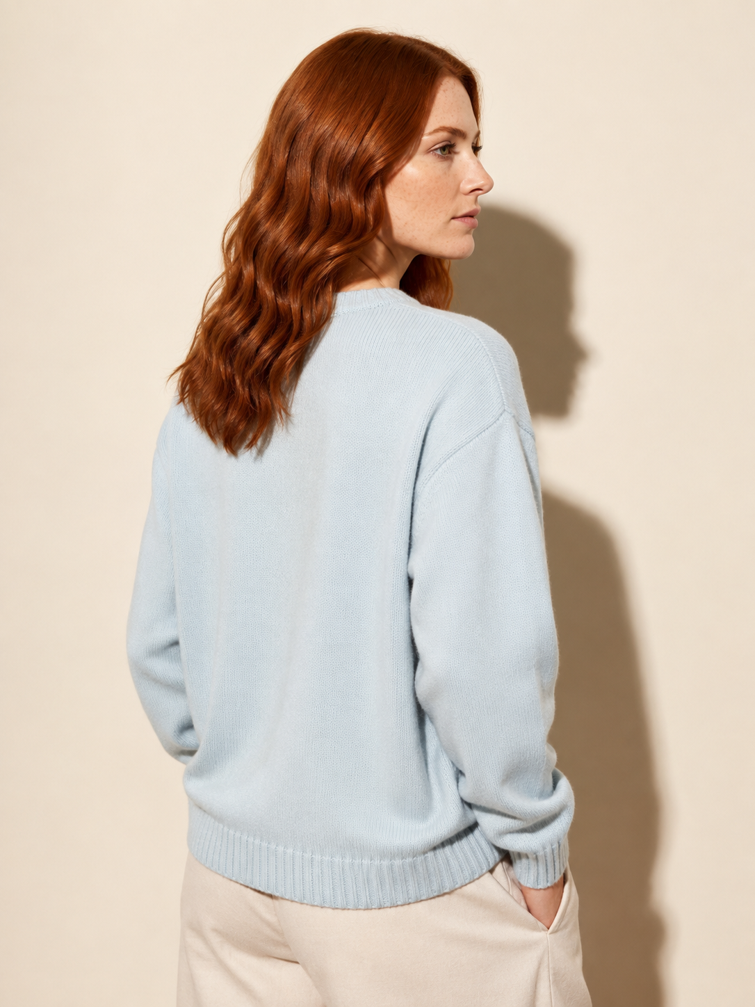 Women's Dachshund Motif Crewneck Knit Sweater in Sky Blue, 04 back or side, worn by model