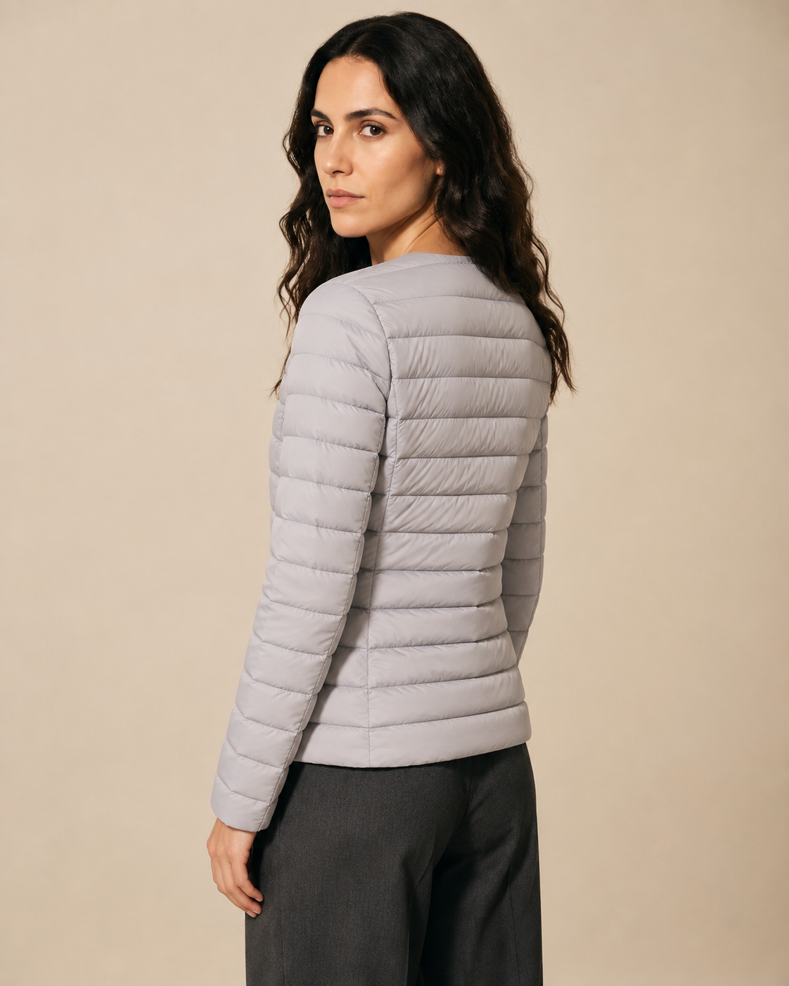 Women's Lightweight Down-Filled Quilted Jacket for Layering in Silver, 04 back or side, worn by model