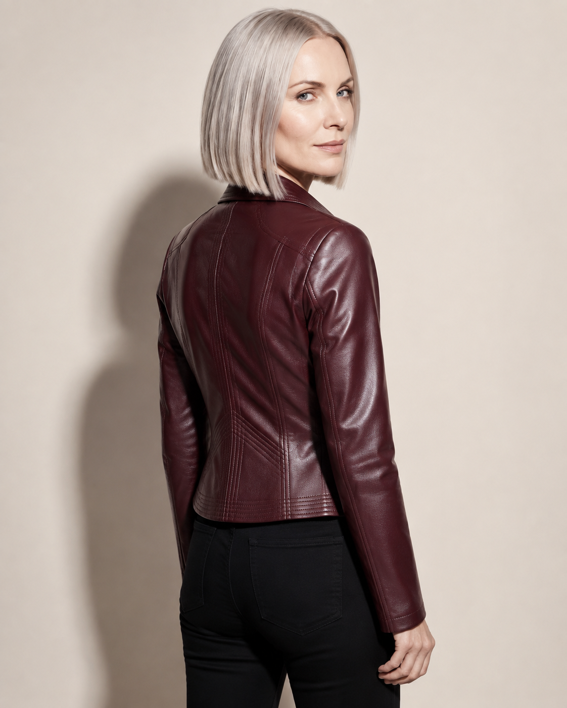 Women's Faux Leather Moto Jacket with Zip Front in Angola Red, 04 back or side, worn by model