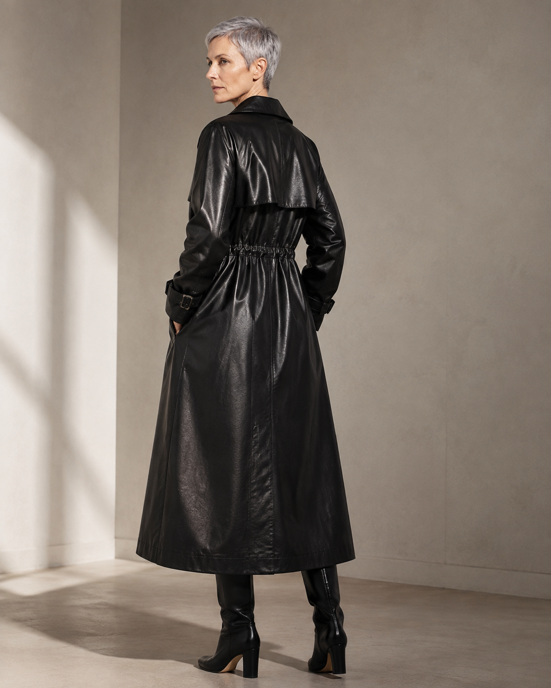 Women's Belted Leather-Look Trench Coat for Everyday Layering in Black, 04 back or side, worn by model