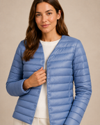 Women's Lightweight Down-Filled Quilted Jacket for Layering in Light Blue, 05 material macro, worn by model