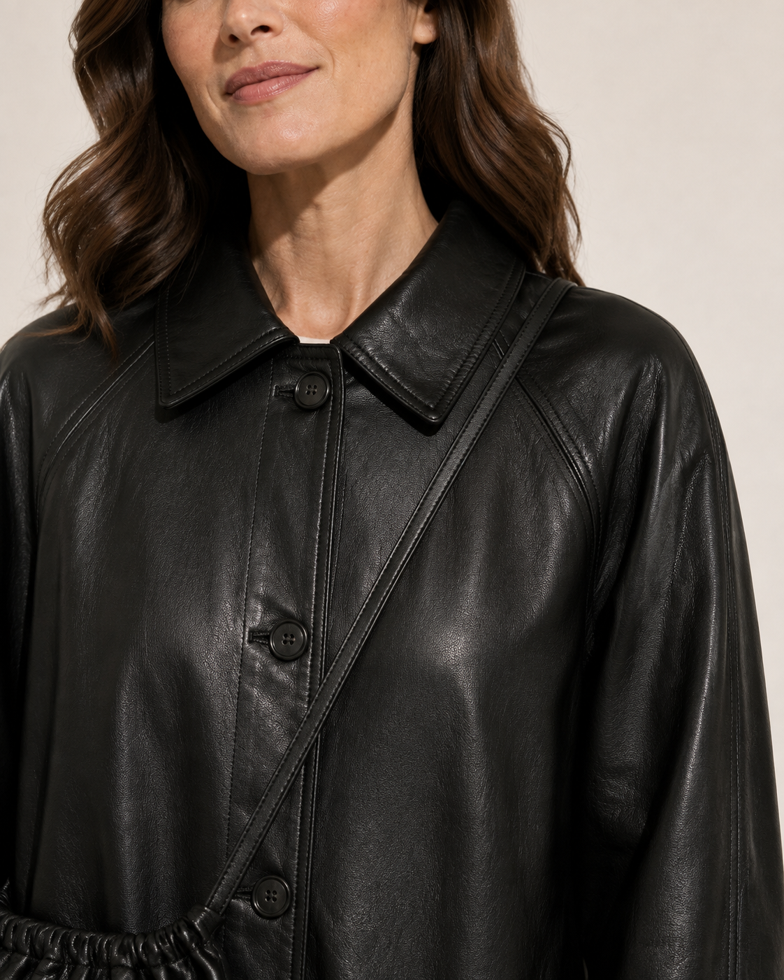Women's Oversized Faux Leather Utility Jacket with Drawstring in Black With Bag, 05 material macro, worn by model