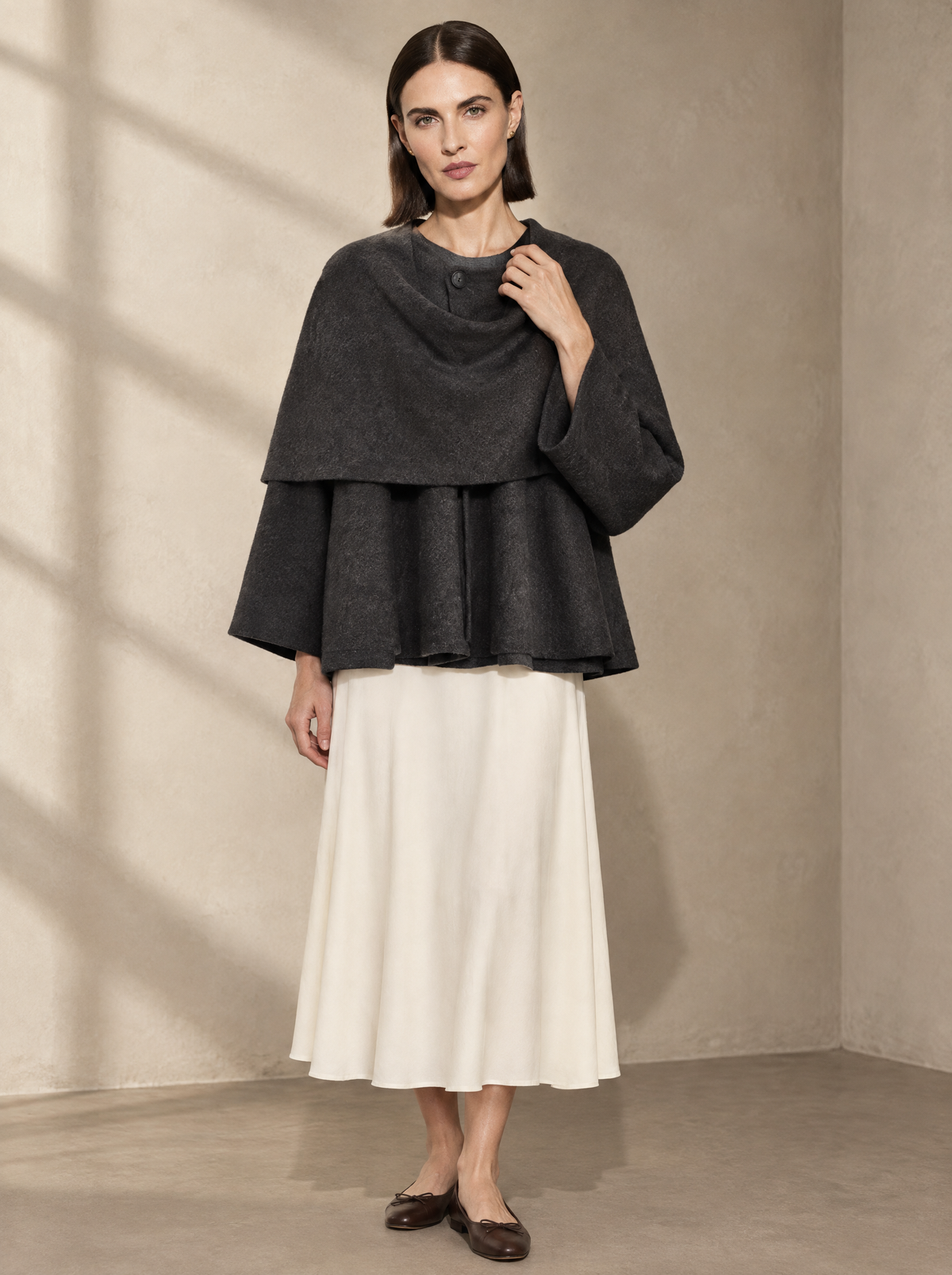 Warm editorial room · Soft sophisticated / old money Grey adjusting