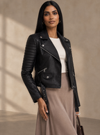 Warm editorial room · Soft sophisticated / old money Black adjusting