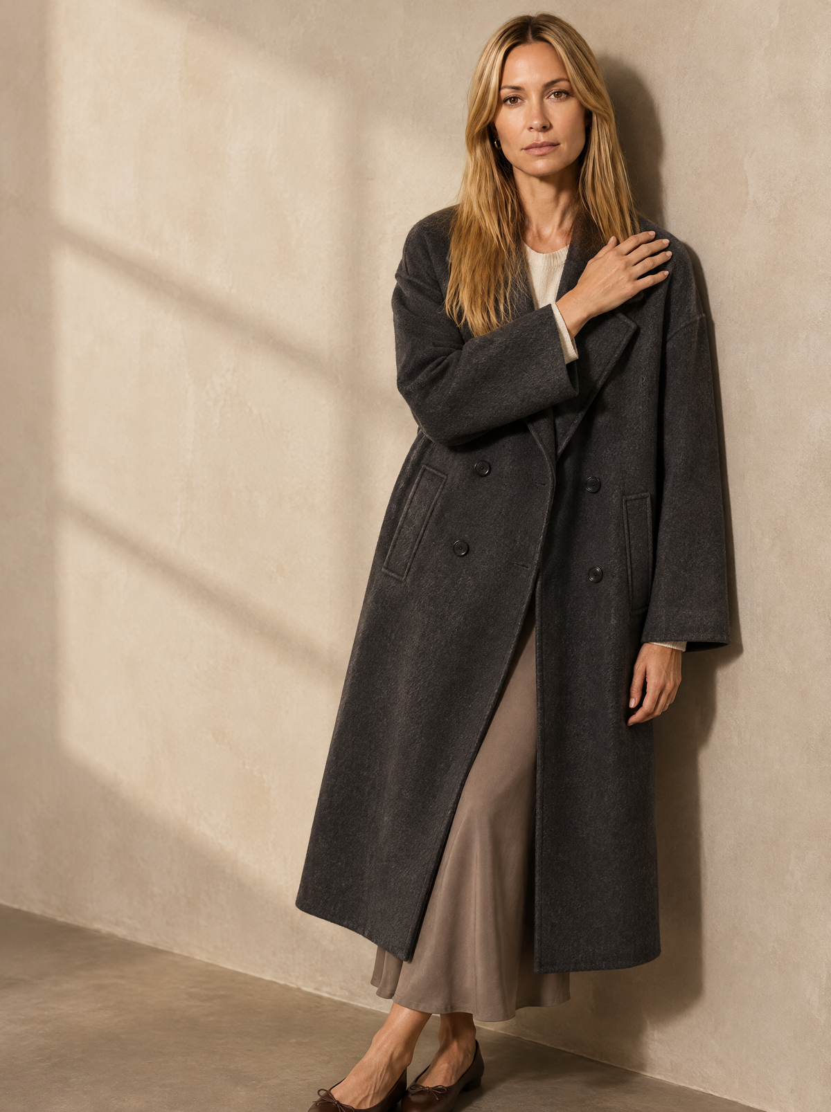 Warm editorial room · Soft sophisticated / old money Grey seated or lean