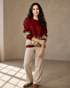 Women's Colour Block Argyle Knit Sweater in Red, loose arm cross, worn by model