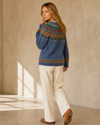Women's Multicolour Patterned Crew Neck Sweater in Blue, walking away, glance back, worn by model