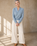 Women's Wrap V-Neck Knit Sweater for Everyday Layering in Stone blue, hands clasped front, worn by model