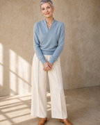 Women's Wrap V-Neck Knit Sweater for Everyday Layering in Stone blue, hands clasped front, worn by model