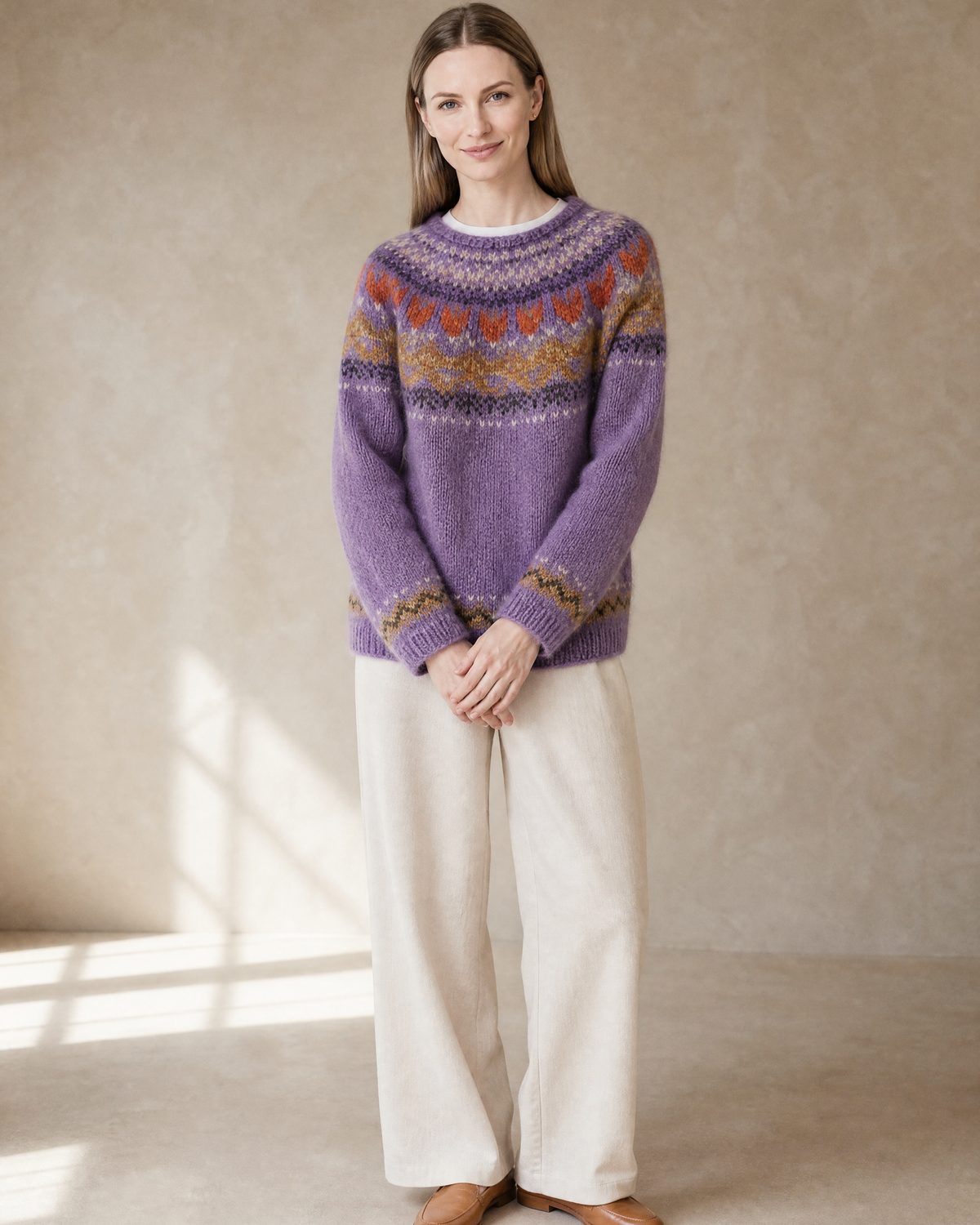 Women's Multicolour Patterned Crew Neck Sweater in Lilac, hands clasped front, worn by model
