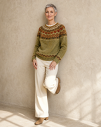 Women's Multicolour Patterned Crew Neck Sweater in Olive, back to wall, knee bent, worn by model