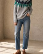 Women's Fashionable Pullover Sweater Top in Teal, hem and pocket detail, worn by model