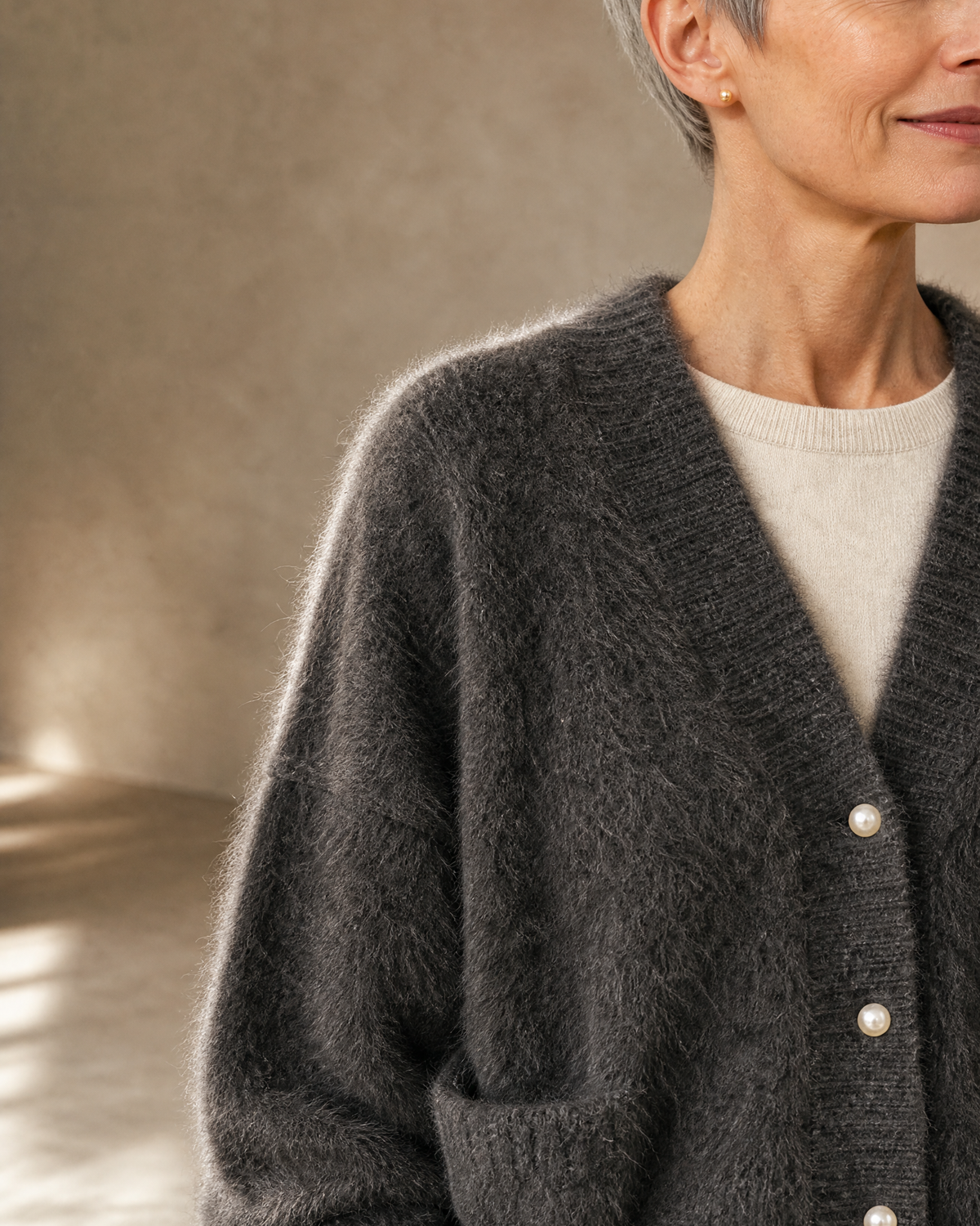 Women's Fuzzy Button Cardigan with Patch Pockets in Grey, texture macro on shoulder, worn by model