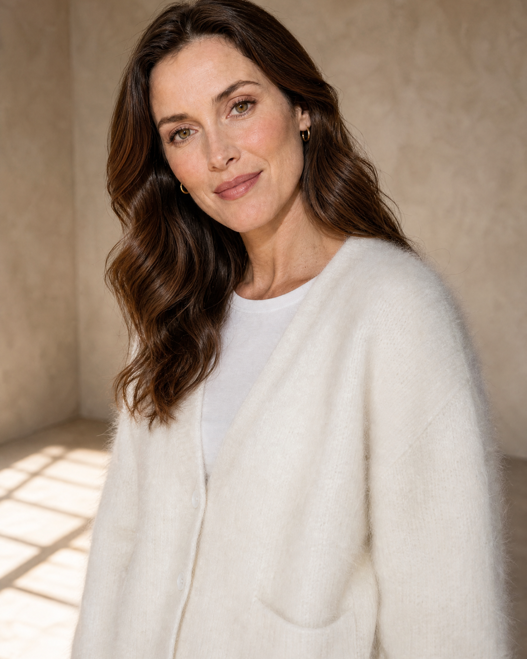 Women's V-Neck Button Cardigan with Pockets in White, neckline three-quarter portrait, worn by model