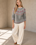 Women's Multicolour Patterned Crew Neck Sweater in Pink Diamond, sleeves pushed, arms down, worn by model