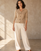 Women's Stand Collar Button Front Cardigan in Camel, sleeves pushed, arms down, worn by model