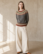 Women's Multicolour Patterned Crew Neck Sweater in Dark Gray, hands behind back, worn by model