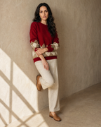 Women's Colour Block Argyle Knit Sweater in Red, wall lean, arms crossed low, worn by model