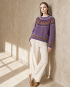 Women's Multicolour Patterned Crew Neck Sweater in Lilac, hip to wall, half profile, worn by model