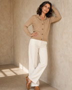 Women's Stand Collar Button Front Cardigan in Camel, wall lean, arm overhead, worn by model