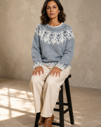 Women's Multicolour Patterned Crew Neck Sweater in Tibetan Wolf, stool, both feet on rung, worn by model