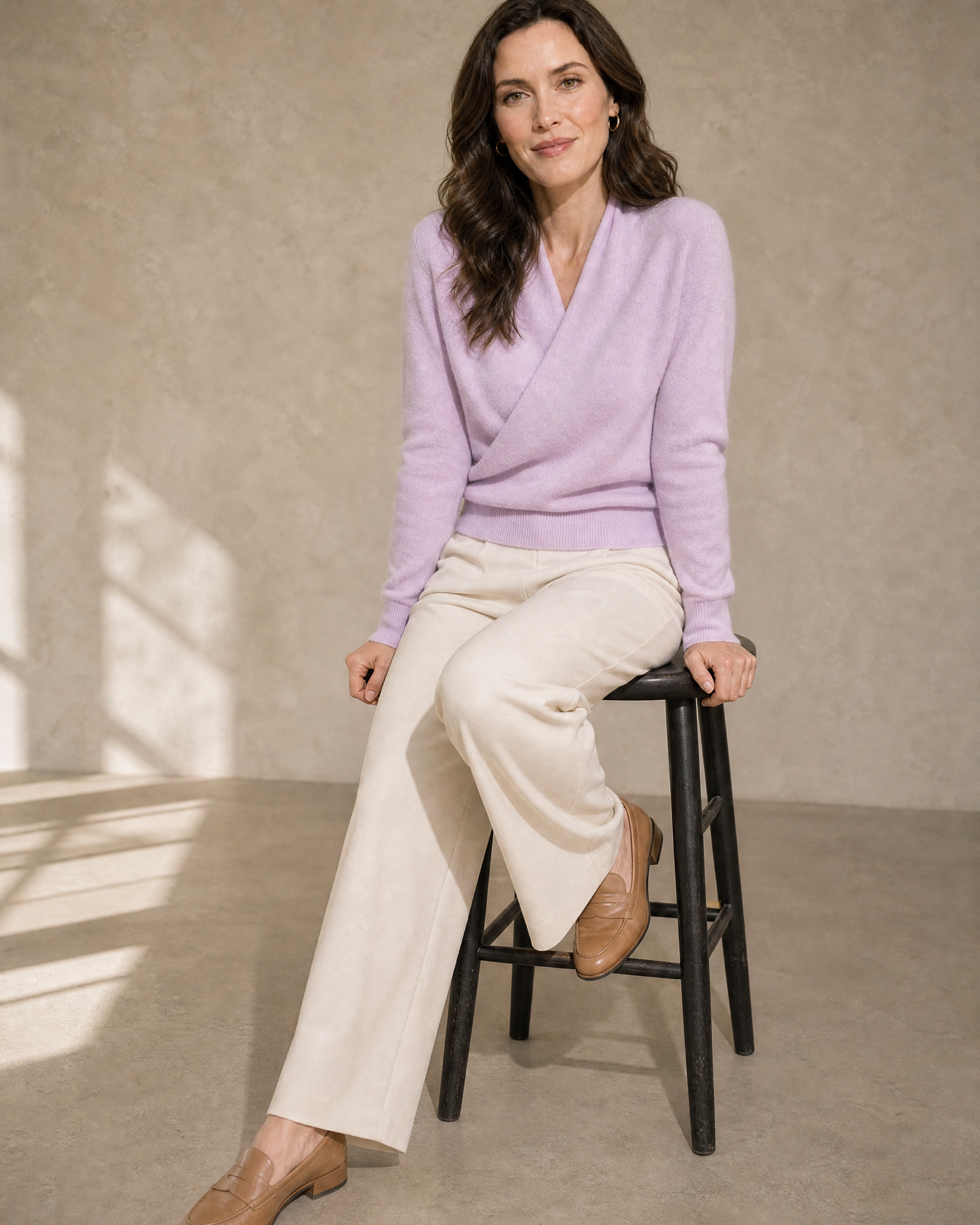 Women's Wrap V-Neck Knit Sweater for Everyday Layering in Lilac purple, stool, leaning back on hands, worn by model