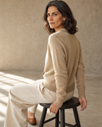 Women's Stand Collar Button Front Cardigan in Camel, stool, turned away, head back, worn by model