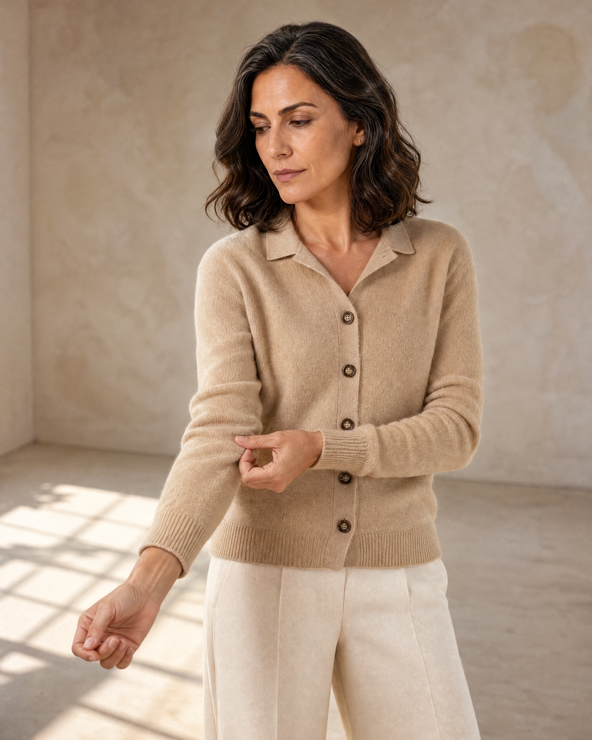 Women's Stand Collar Button Front Cardigan in Camel, sleeve held away, worn by model