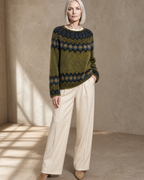Women's Multicolour Patterned Crew Neck Sweater in Green, relaxed standing, one hand at hip, worn by model