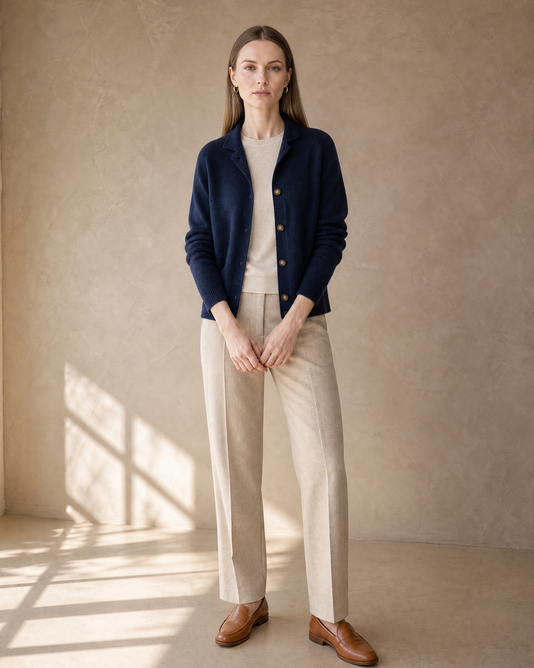 Women's Stand Collar Button Front Cardigan in Navy Blue, standing, hands softly clasped, worn by model
