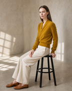 Women's Wrap V-Neck Knit Sweater for Everyday Layering in Autumn yellow, stool, turned profile, worn by model