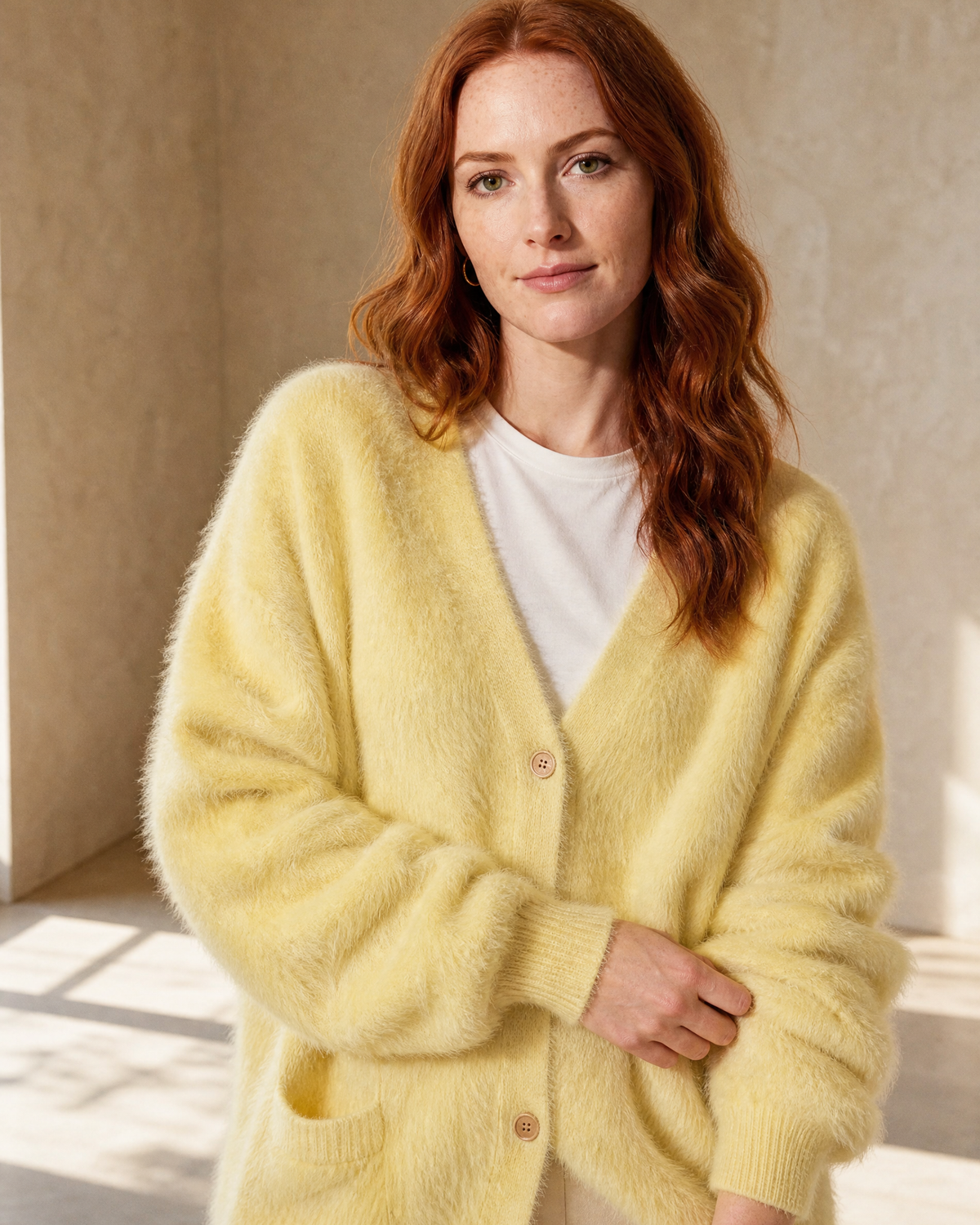 Women's V-Neck Button Cardigan with Pockets in Yellow, neckline and cuff detail, worn by model