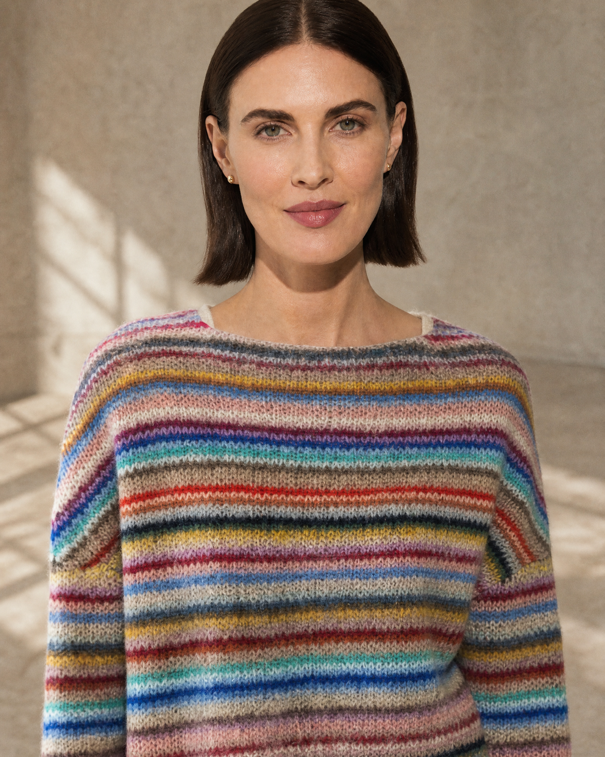Women's Multicolour Patterned Crew Neck Sweater in Rainbow Bar, yoke detail, arms relaxed, worn by model