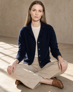 Women's Stand Collar Button Front Cardigan in Navy Blue, floor, cross-legged with open hands, worn by model
