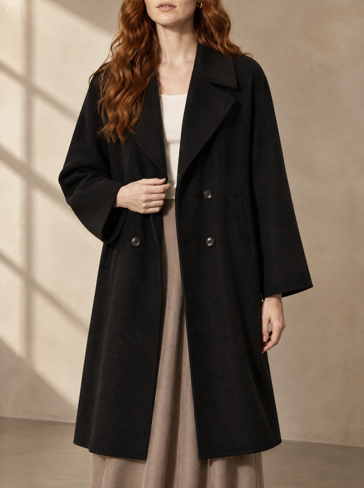 Warm editorial room · Soft sophisticated / old money Black bust to thigh