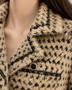 Camel cardigan — texture and button detail