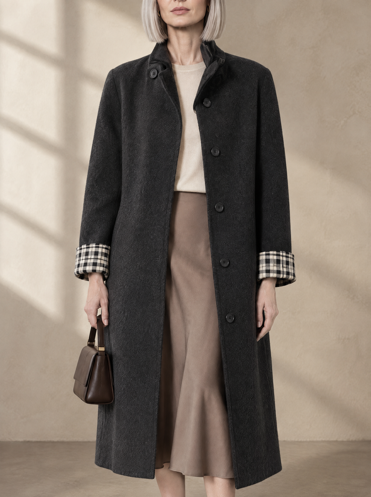 Warm editorial room · Soft sophisticated / old money Black bust to thigh